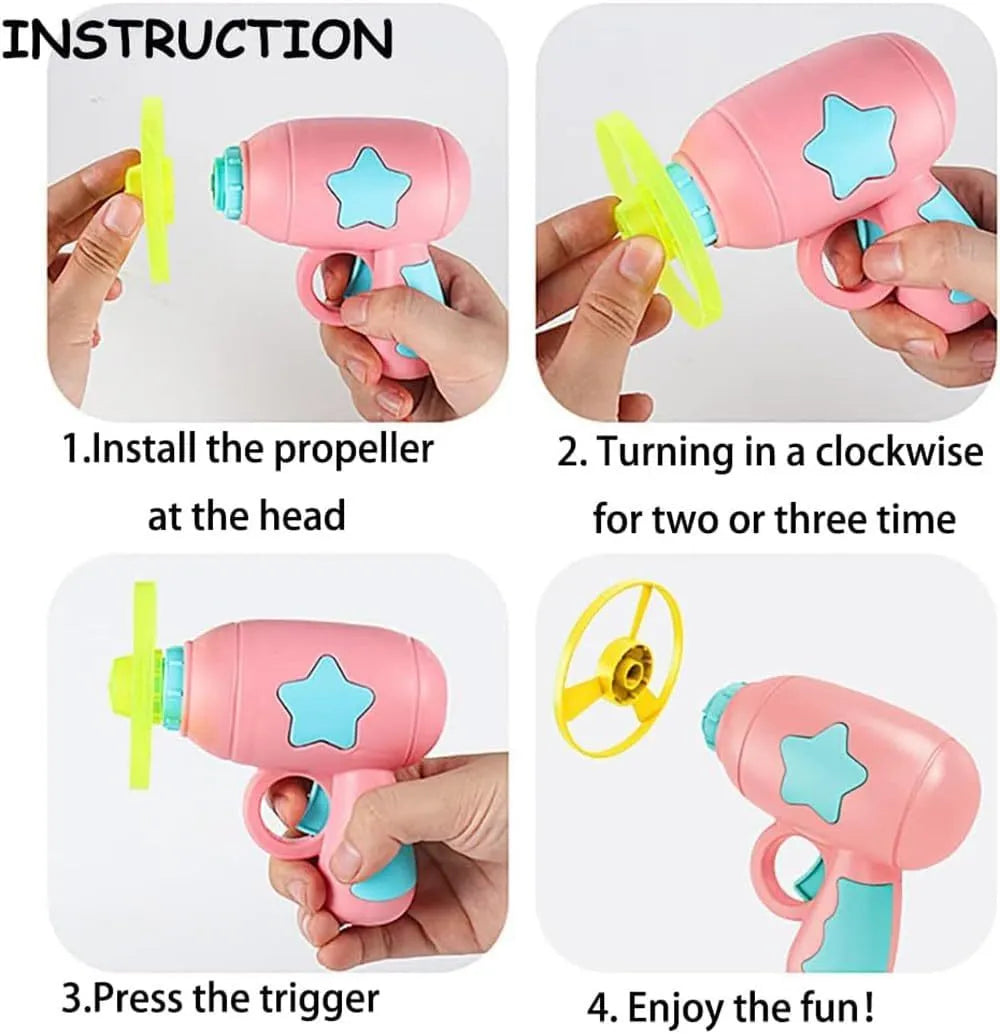 Blue interactive cat toy gun launcher with a mounted pink plastic frisbee, shown with a second frisbee disc.