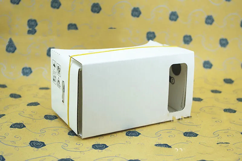 VR Cardboard Glasses viewer for smartphones with 3D lenses and adjustable straps in pink or white