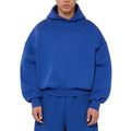 Man wearing a solid colour fleece-lined cotton pullover hoodie with a wool lining.