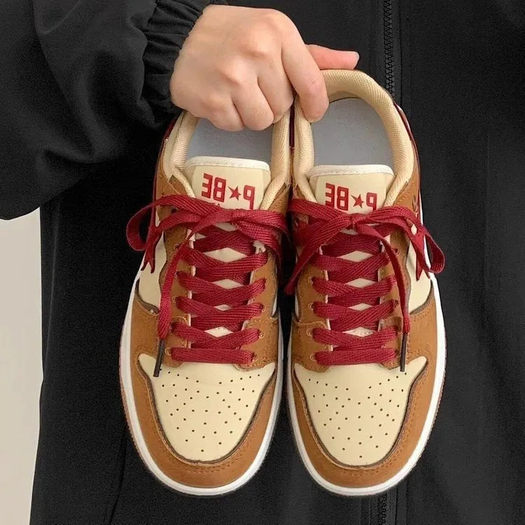 Brown women's casual sneakers with sequin accents and platform sole