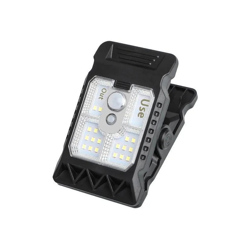 White rectangular sensor-activated clip lamp with IP65 rating, shown next to a 14500 lithium battery.