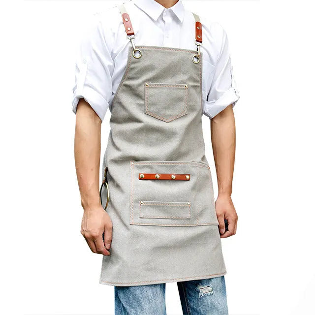 Cross-back strap canvas apron in camel colour with Han Chinese style, shown on a model.