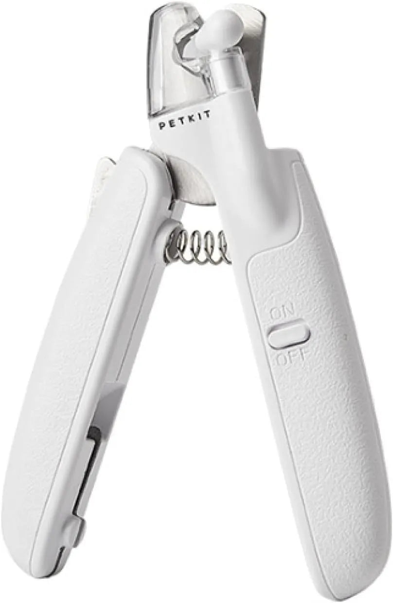 White LED pet nail clipper with transparent anti-splash guard open, showing triangular stainless steel blade