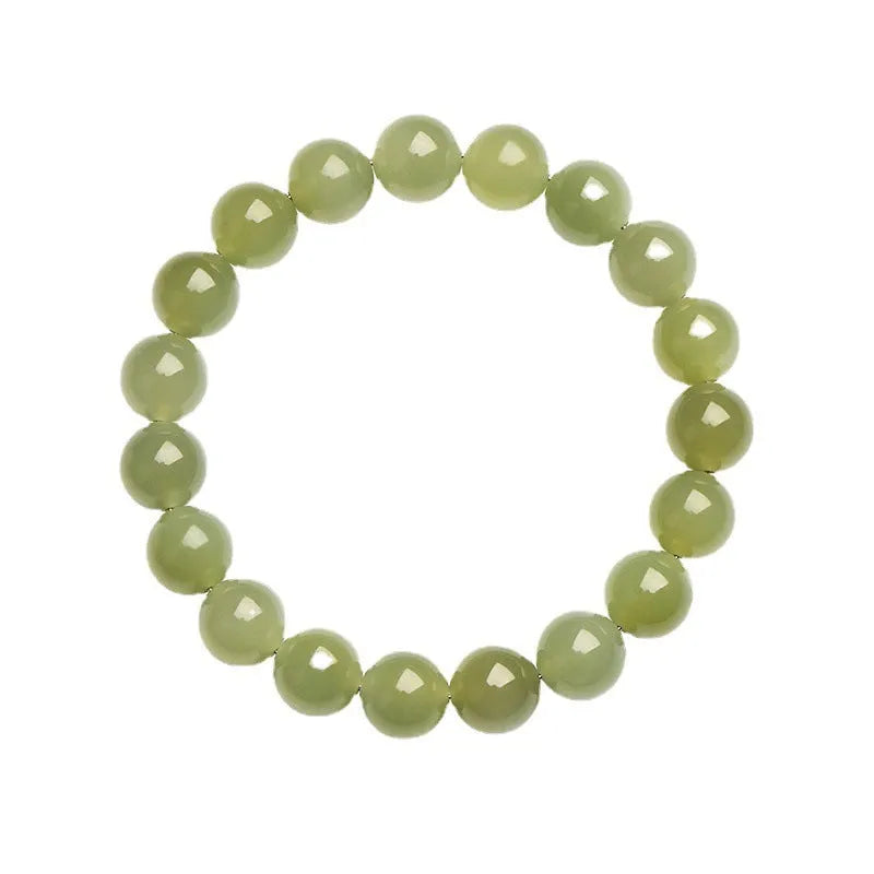 Polished Hetian jade ball bracelet showing ice-like clear beads in deep and light water variations
