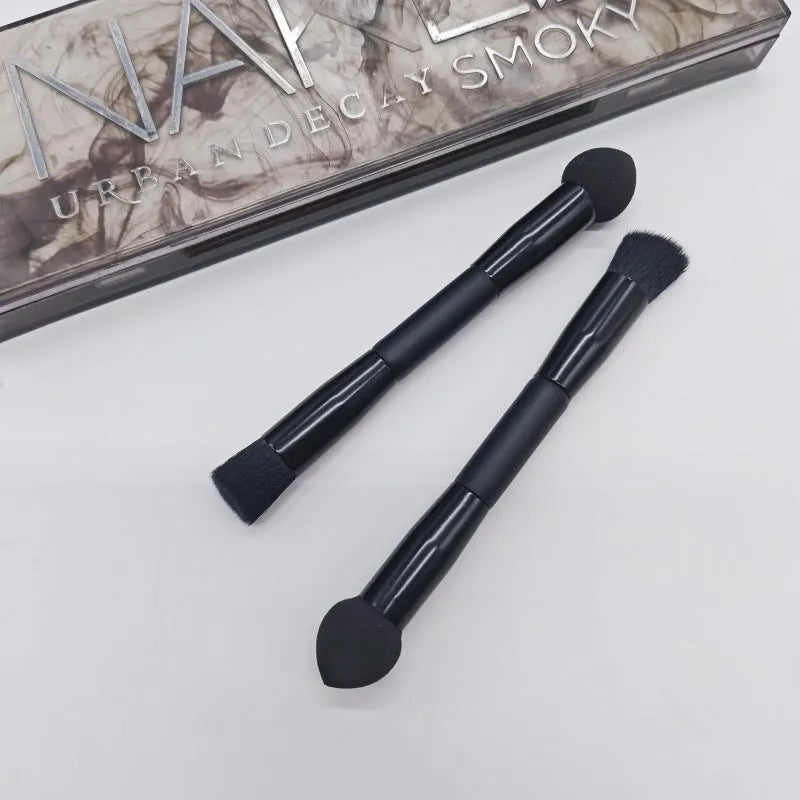 Double-headed makeup brush with miter sponge tip and artificial fibre bristles on wooden handle