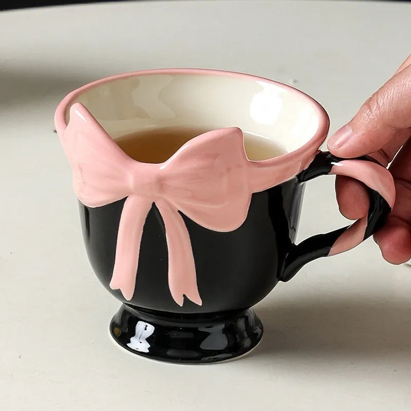 Ceramic mug with bow and heart decoration in Black Pink or White Powder colour, 301-400ml capacity