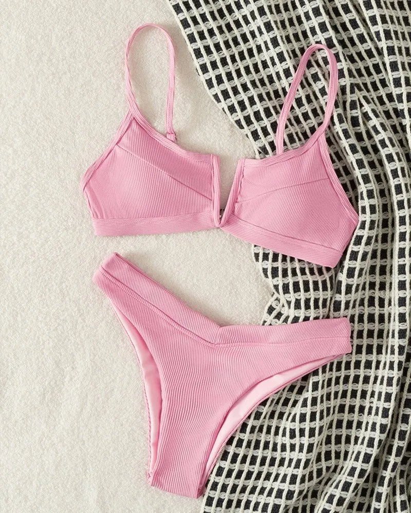 Women's high waist triangle split swimsuit set in multiple colours, showing top and shorts.