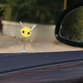 Swing Spring Bee car decoration ornament with cartoon design measuring 3x3 cm