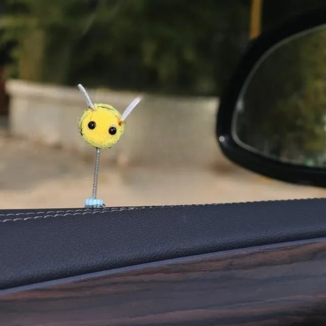 Swing Spring Bee car decoration ornament with cartoon design measuring 3x3 cm