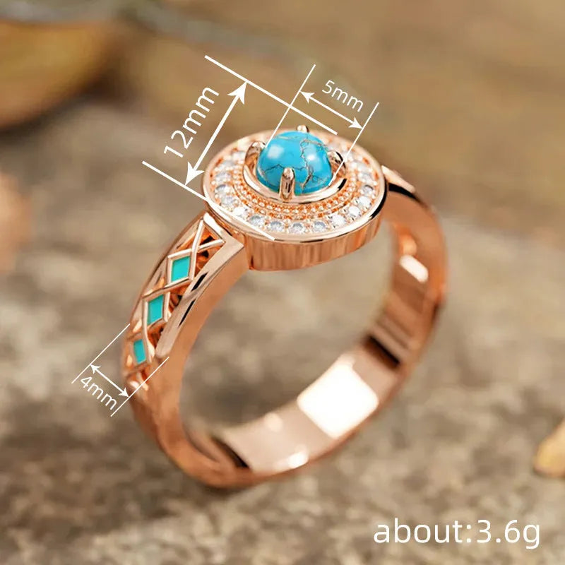 Women's rose gold copper ring with turquoise stone and geometric zircon inlay design.