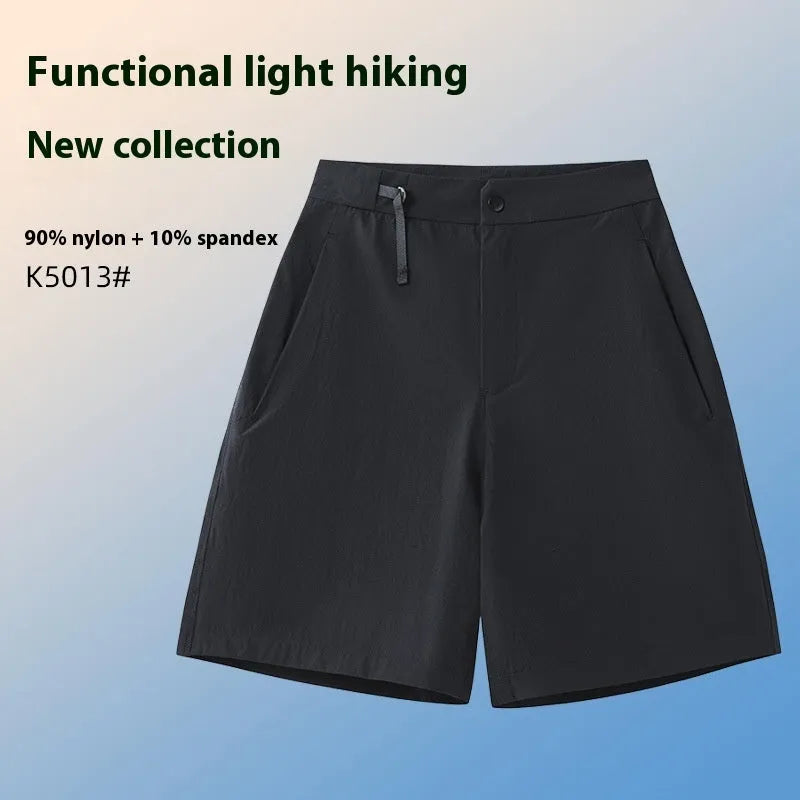 Men's solid colour quick-drying sports shorts with elastic waist, shown in army green.
