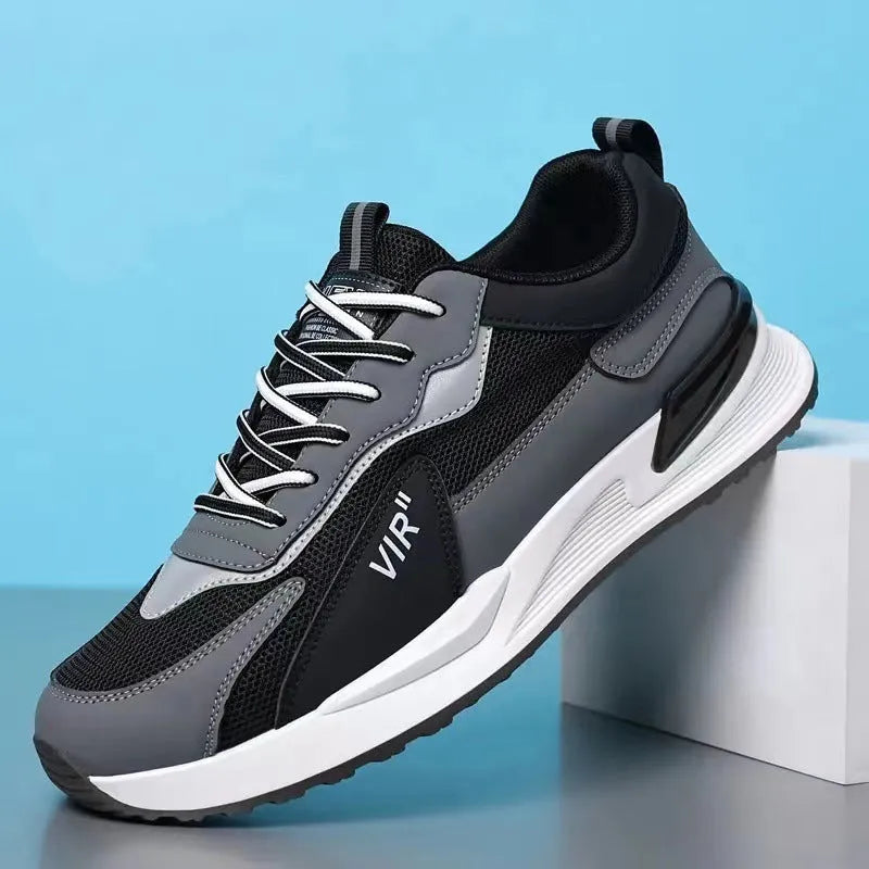 Men's colour block mesh sneakers in grey with lace-up closure and low-top design.