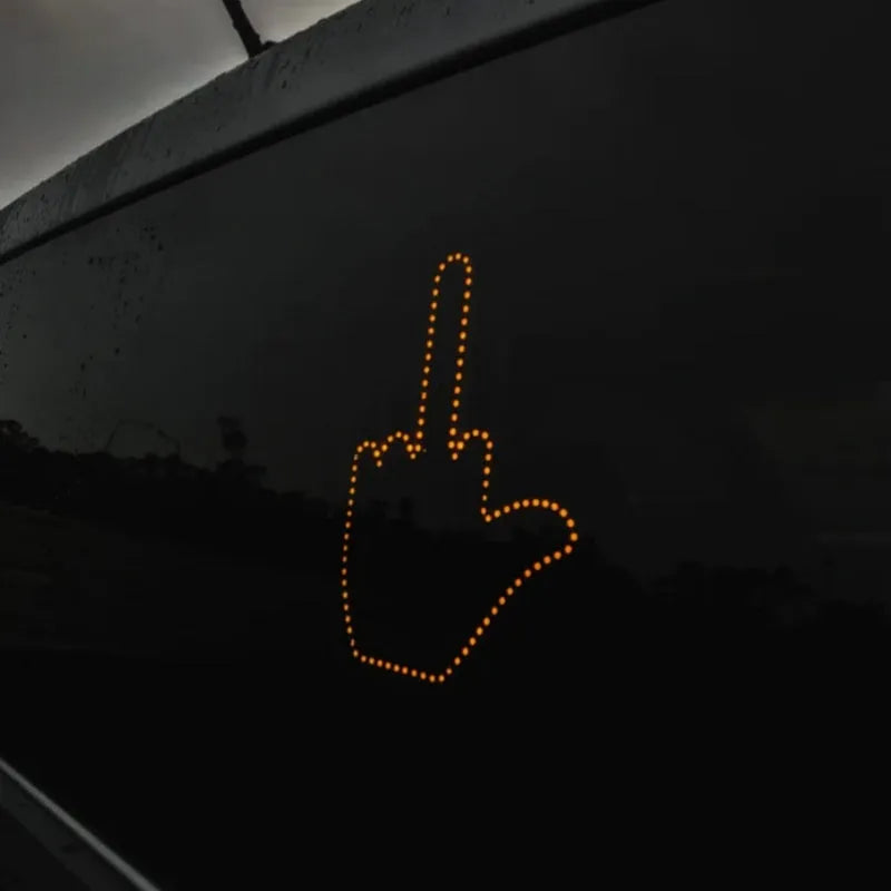 Black plastic LED illuminated gesture hand sign light for cars with remote control