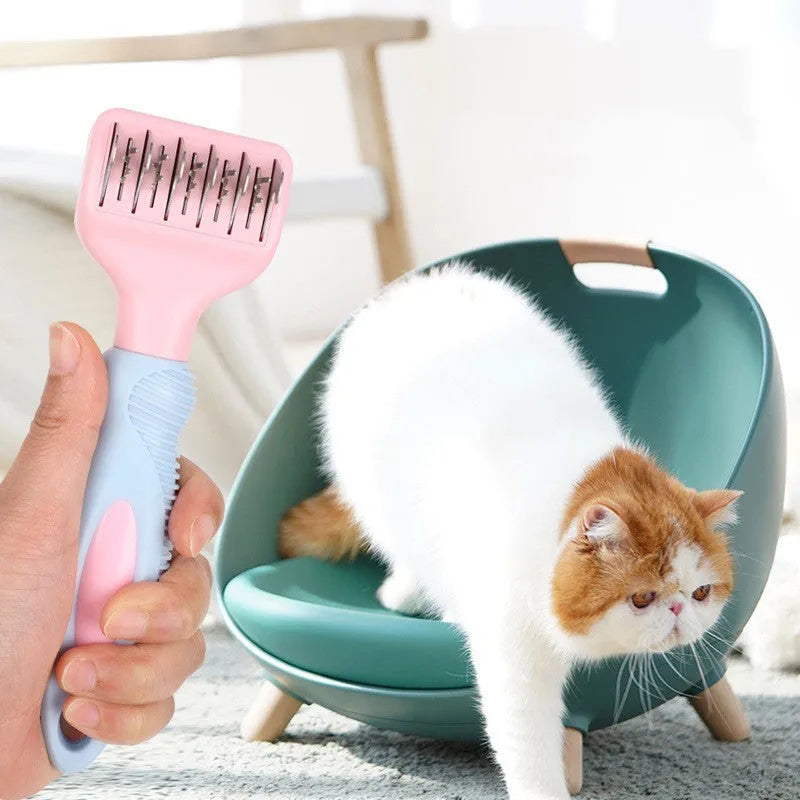 Pet grooming comb with stainless steel knot knife teeth and pink handle for detangling matted fur