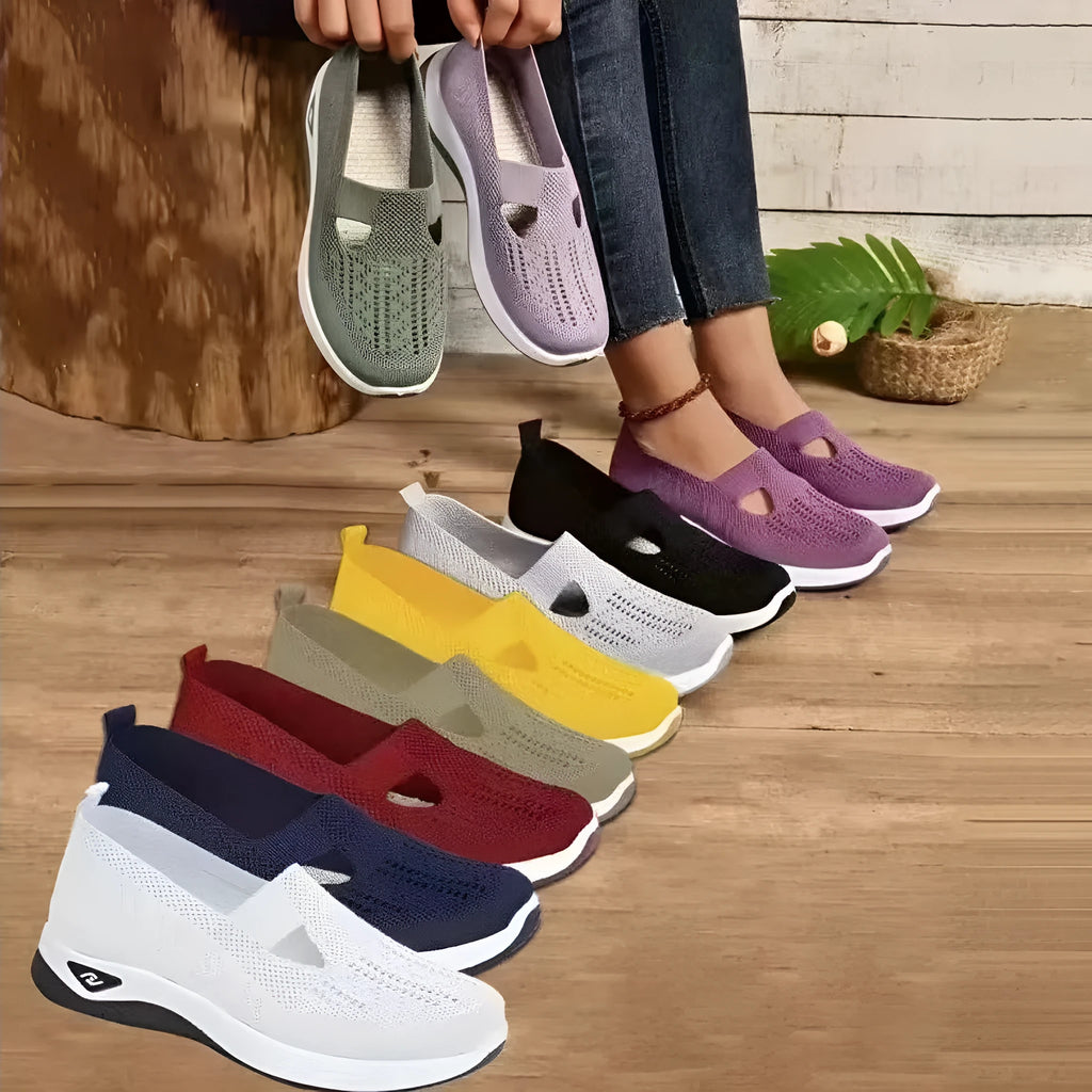 Low-top women's casual mesh shoes with a T-strap, in a selection of solid colours on a soft PVC sole.