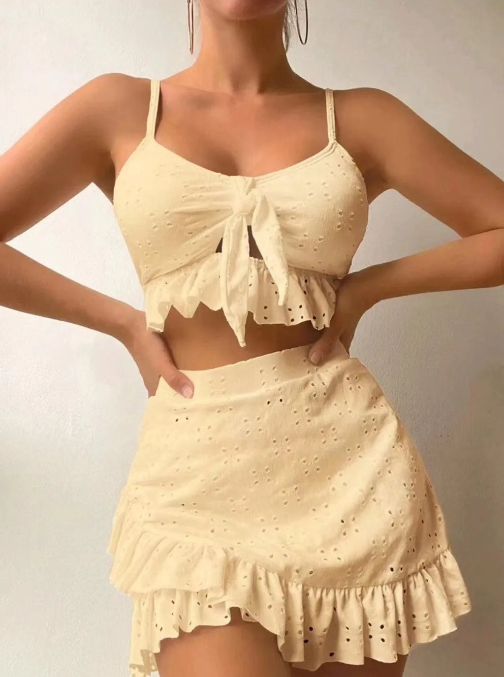 Women's three-piece bikini swimsuit with split hip skirt in polyester fabric