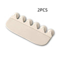 White PVC toilet urine splash guard board for boys potty training on a toilet seat.