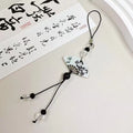 Chinese style bead pendant keychain with floral patterns in baked varnish finish