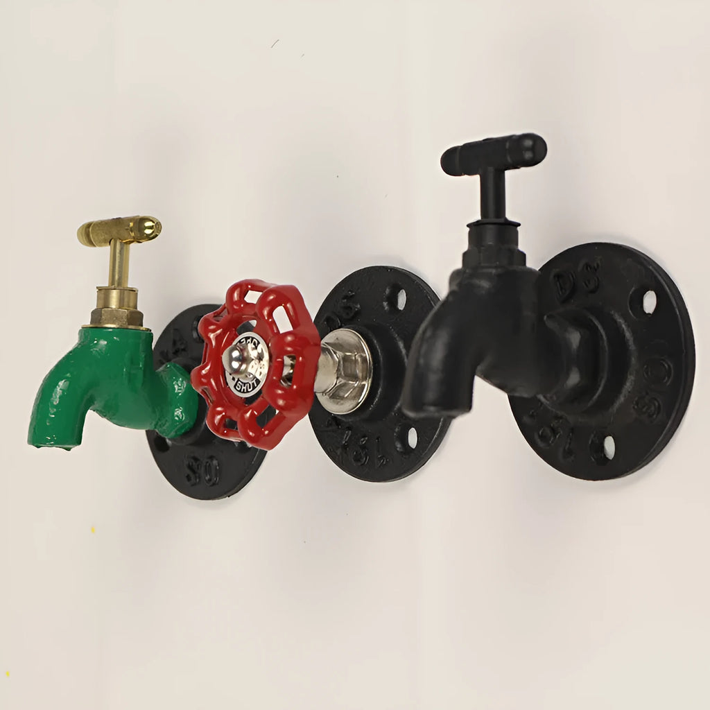 Metal water pipe style towel hook mounted on a wall in black, green, or red.