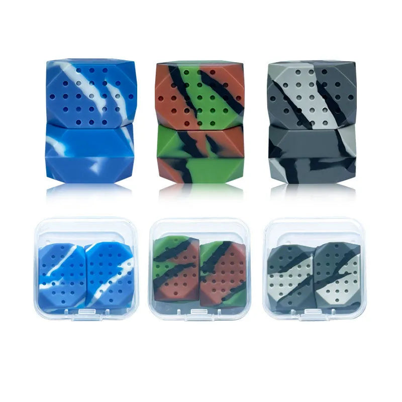 Two camouflage-pattern silicone facial muscle fitness balls for jawline training in a transparent box.