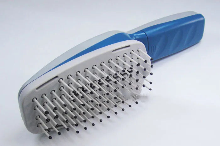 White pet grooming ion comb with a removable brush head, showing 78 teeth and a one-key switch.
