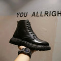 Black men's Dr Martens high-top platform combat boots with a side zip fastening.