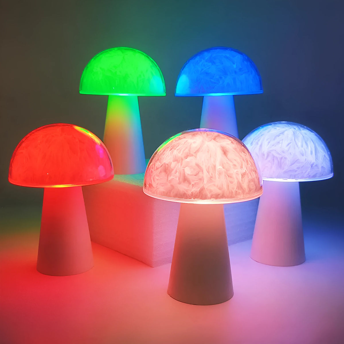 Mushroom-shaped remote control ambience light with colourful RGB lighting on wooden surface