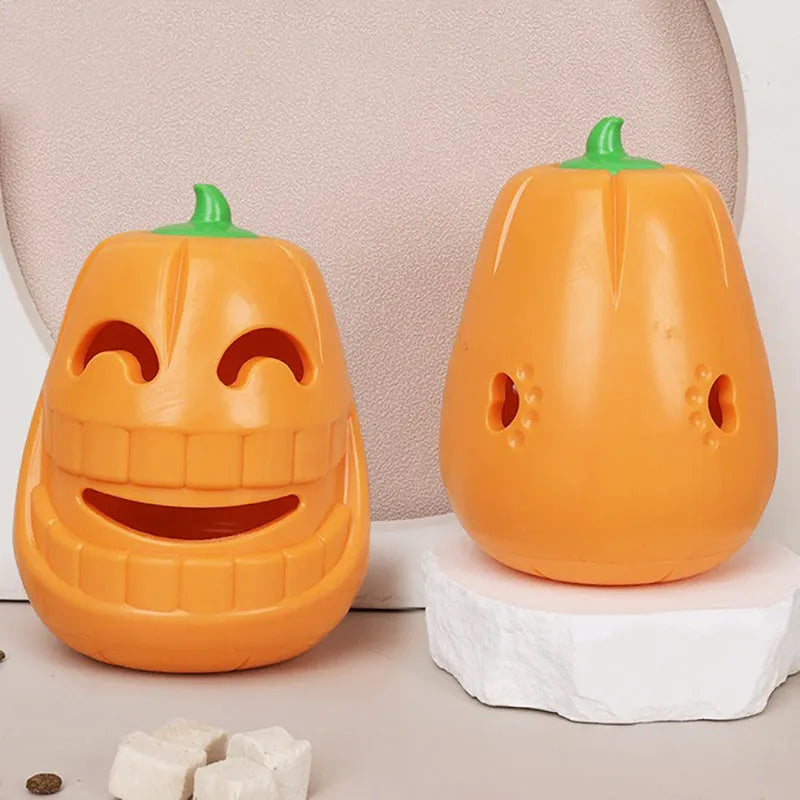 Orange Halloween pumpkin shaped interactive dog chew toy with treat dispensing funnel