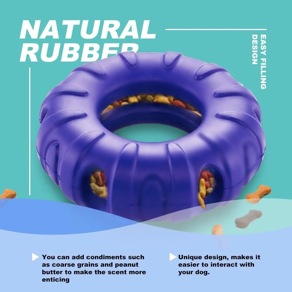 Beef-flavoured red rubber tyre dog chew toy with oval openings for treat dispensing