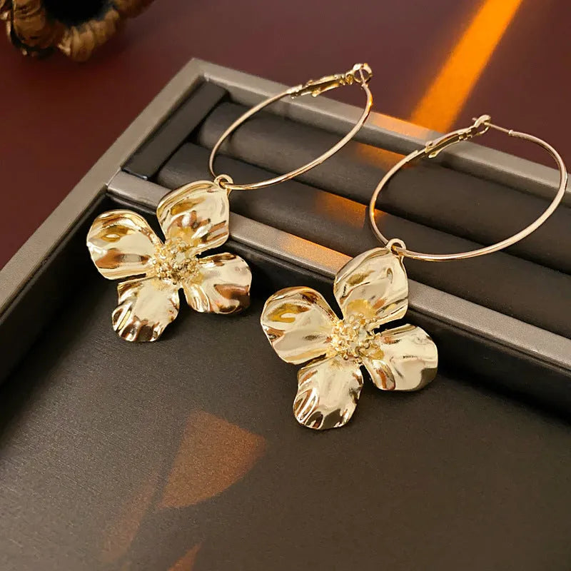 Silver needle metal flower earrings with geometric design in gold or silver electroplated finish