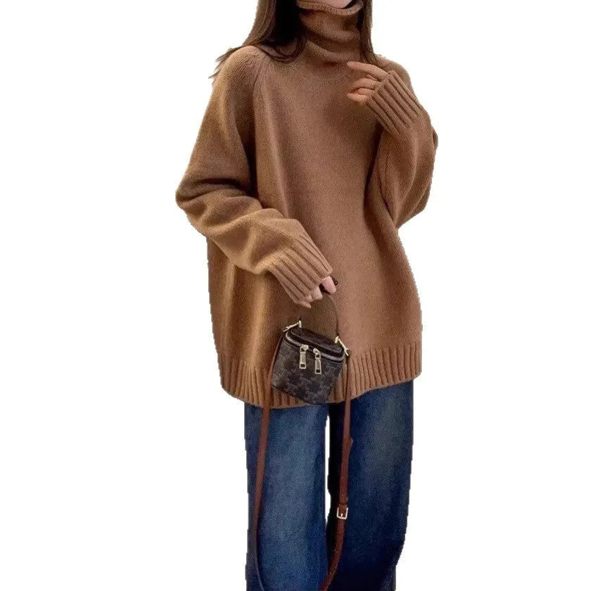 Women's loose thick turtleneck sweater with a curled pile collar in a solid colour.