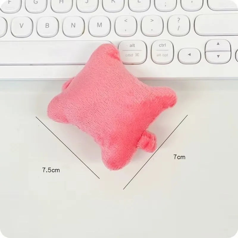 Plush mouse pad wrist protector pillow in blue colour on desk with keyboard