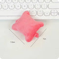Plush mouse pad wrist protector pillow in blue colour on desk with keyboard
