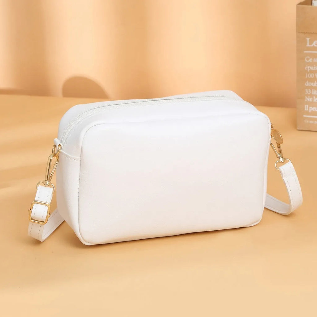 Women's solid colour PU shoulder bag with three-dimensional pocket in urban simplicity design