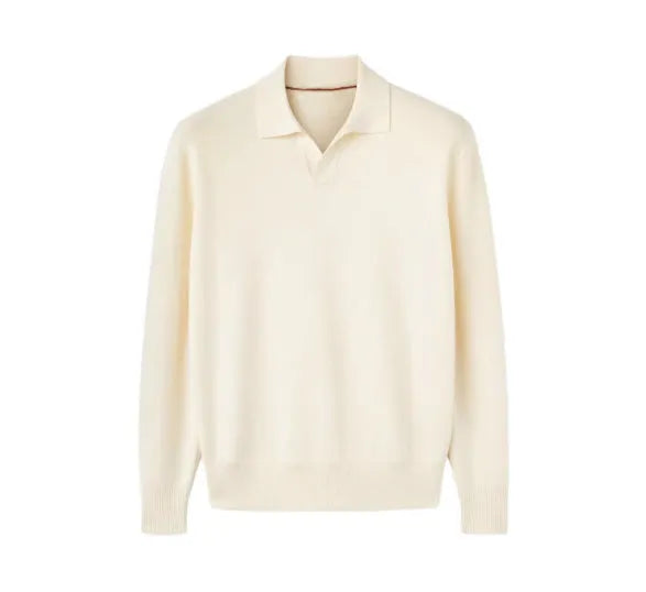 Man wearing a milky white pure wool polo sweater with a lapel collar in a loose fit.