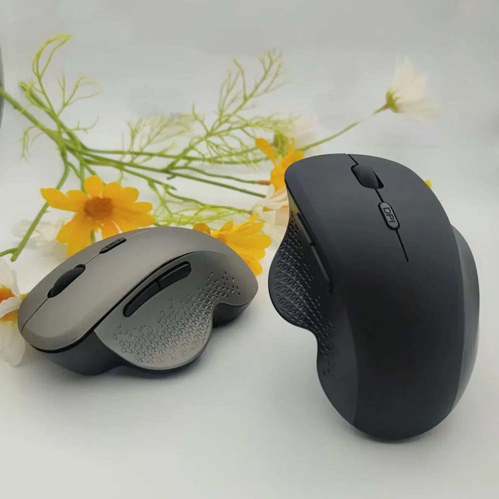 Grey rechargeable wireless mouse for laptops with USB charging cable