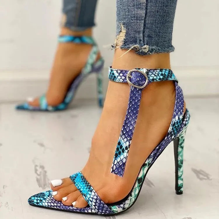 Blue hollow-out high heels with a buckle, pointed toe, and artificial PU upper.