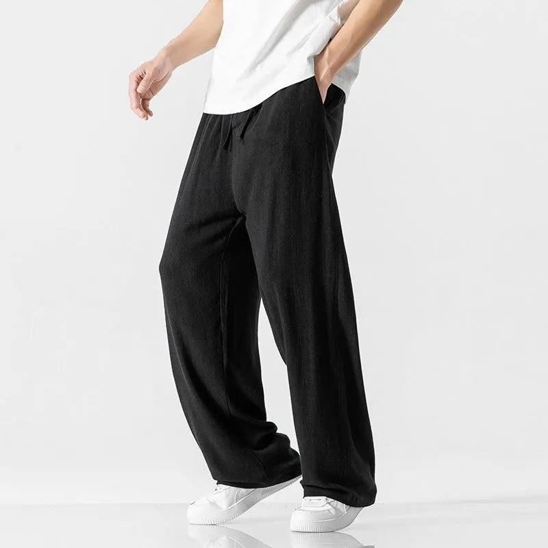 Men's bamboo fibre linen trousers in loose straight-leg cropped cut with drawstring waist