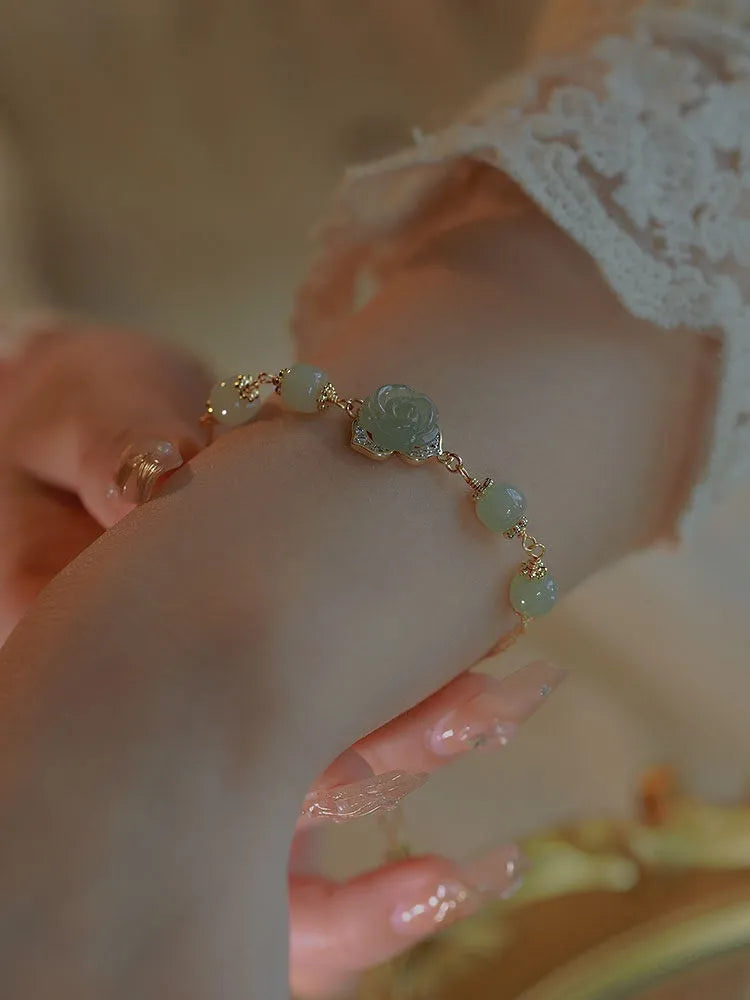 Women's bracelet with Hetian jade rose flower pendant on gold chain