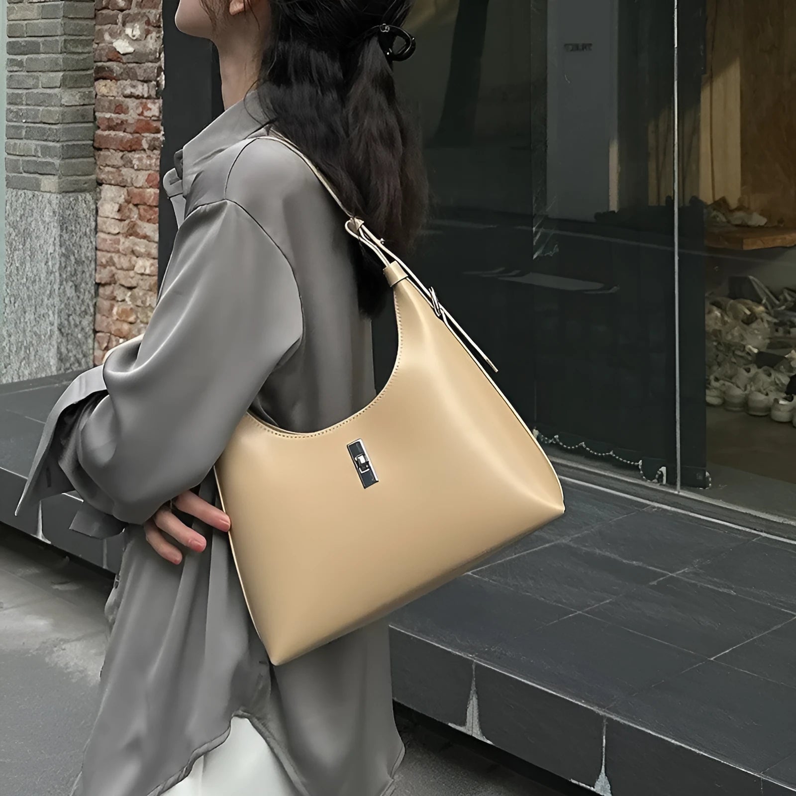 Genuine leather crossbody shoulder bag in dumpling shape with organised compartments