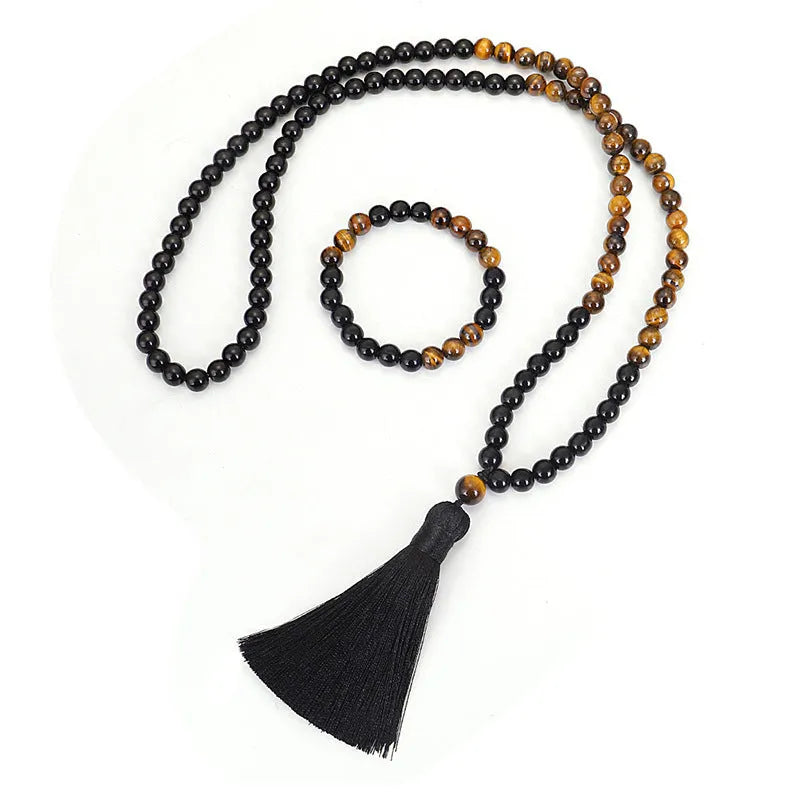 Tiger eye stone convertible tassel chain showing 81cm length and ball bead construction