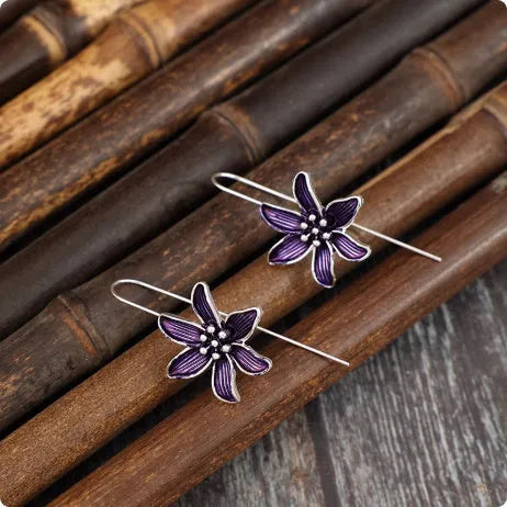 Purple flower-shaped alloy stud earrings with retro design and nickel-free posts