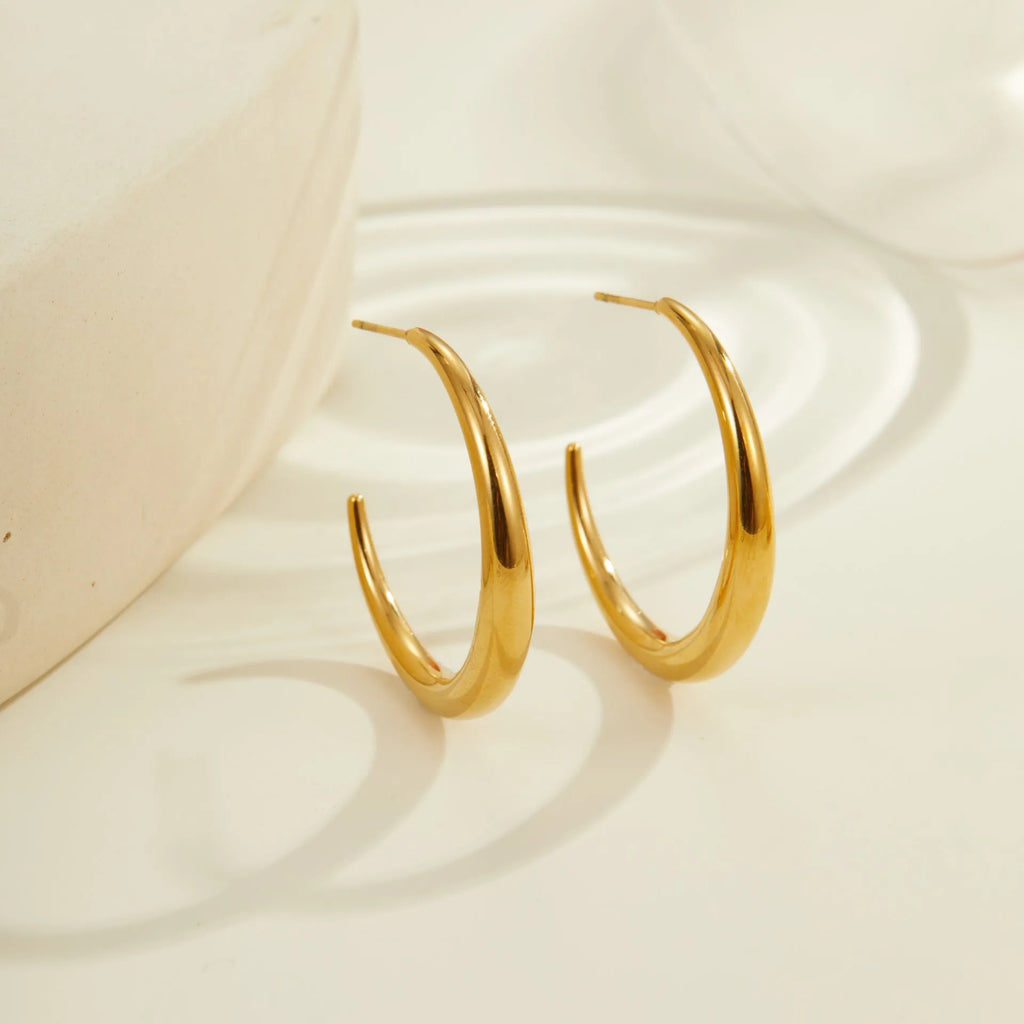 Titanium steel geometric circular hoop earrings with 18K gold plating in large or small sizes
