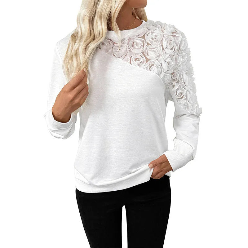White women's long sleeve pullover top with floral pattern, loose fitting
