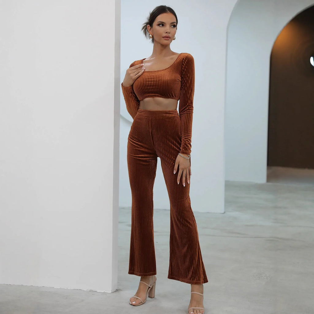 Caramel-colour long sleeve sweater and matching trousers casual set on a hanger.