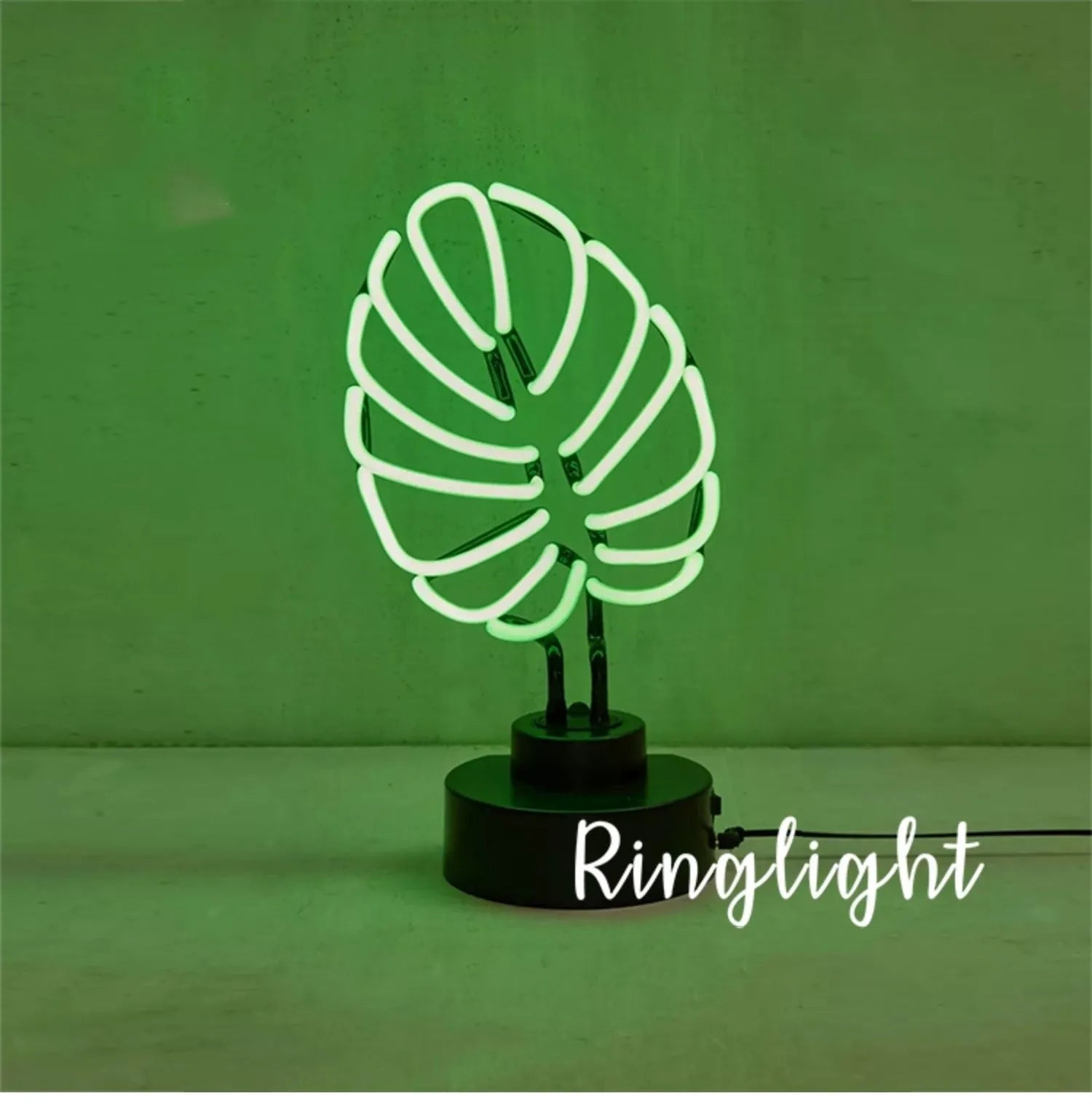 White minimalist bamboo-shaped desk lamp with green glow, showing USB cable and two size options.