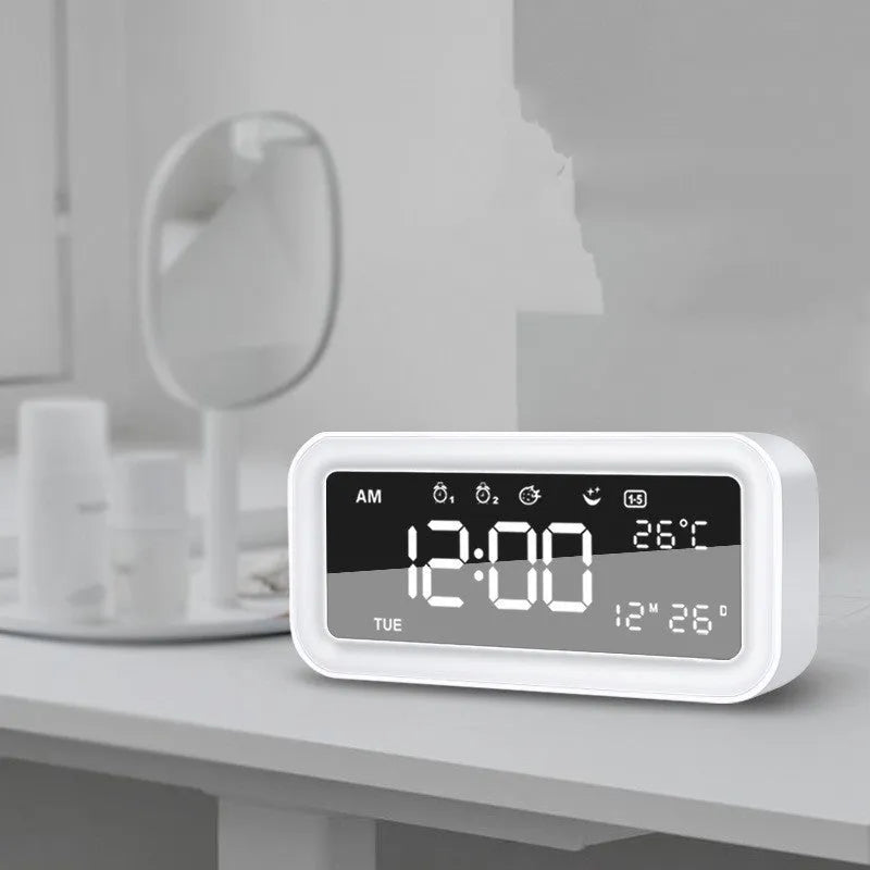 Rectangular multifunctional LED atmosphere light alarm clock with digital display and quartz glass mirror in blue or pink plastic casing