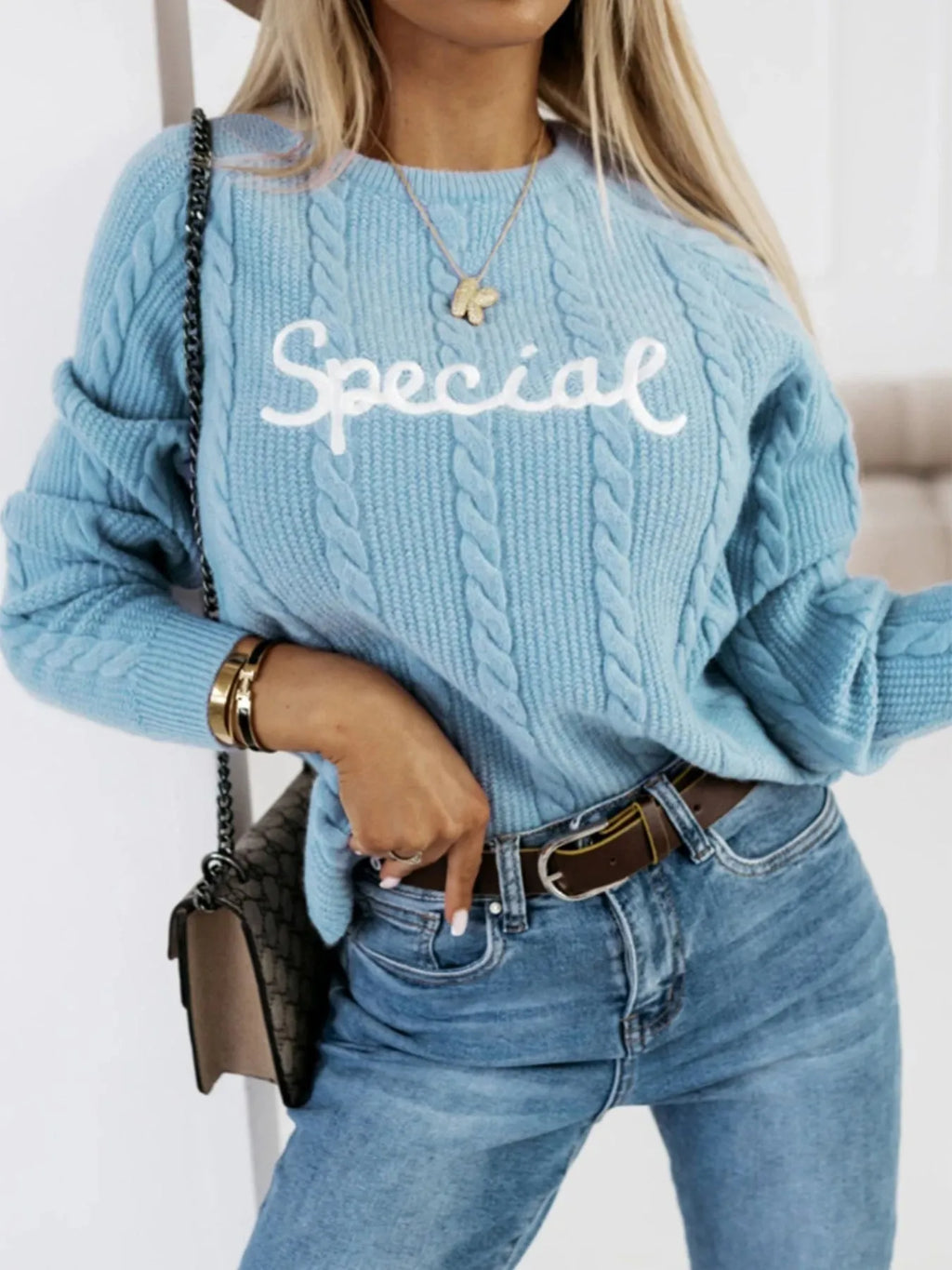 Blue leisure pullover sweater with embroidered letter design and crew neck.