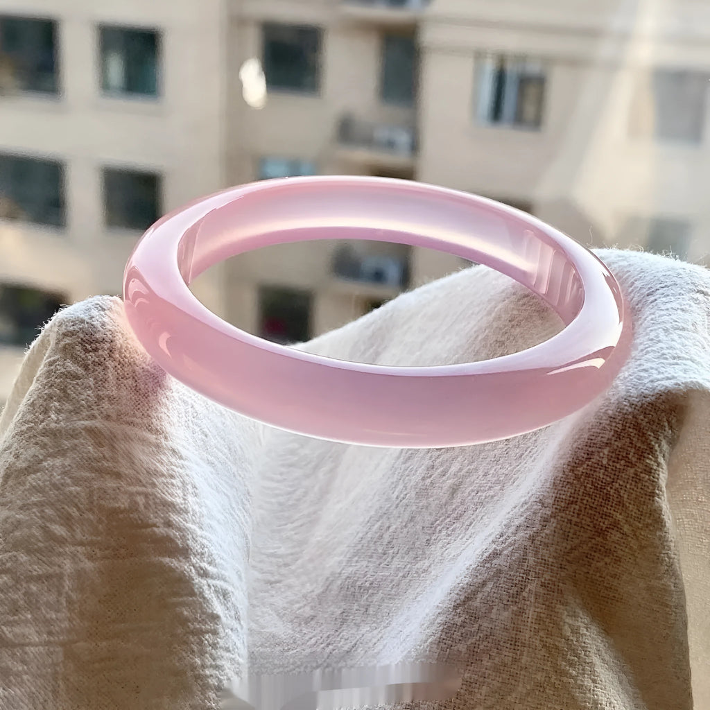 Natural agate wide tyre bead bracelet shown in multiple colour options including pink, blue, and landscape agate.