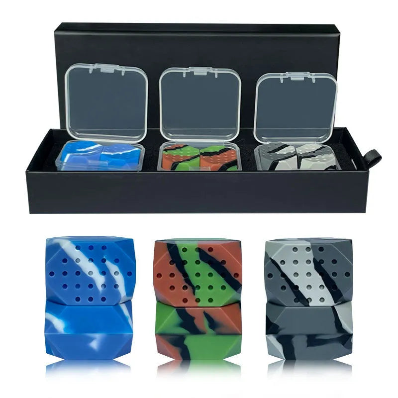 Two camouflage-pattern silicone facial muscle fitness balls for jawline training in a transparent box.